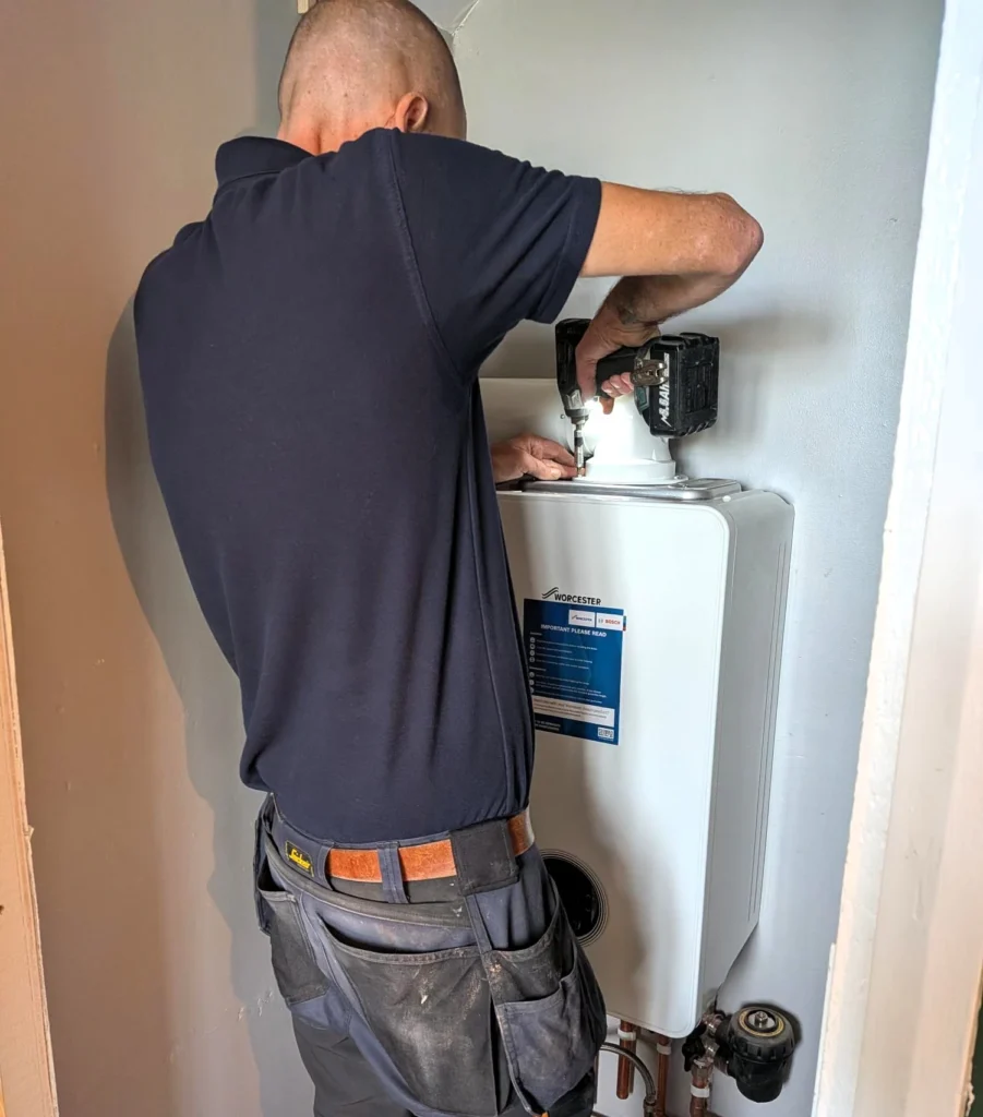 Hbe Heating Engineer Installing New Worcester Boiler